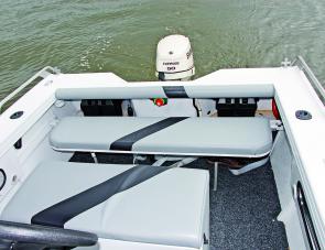 It makes sense in a fishing craft to have a bench seat that can fold down out of the way.